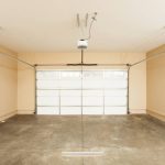 A garage door that is open and has no one inside.