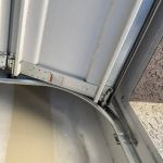 A garage door that has been opened up.