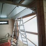 A ladder is in the middle of a room.